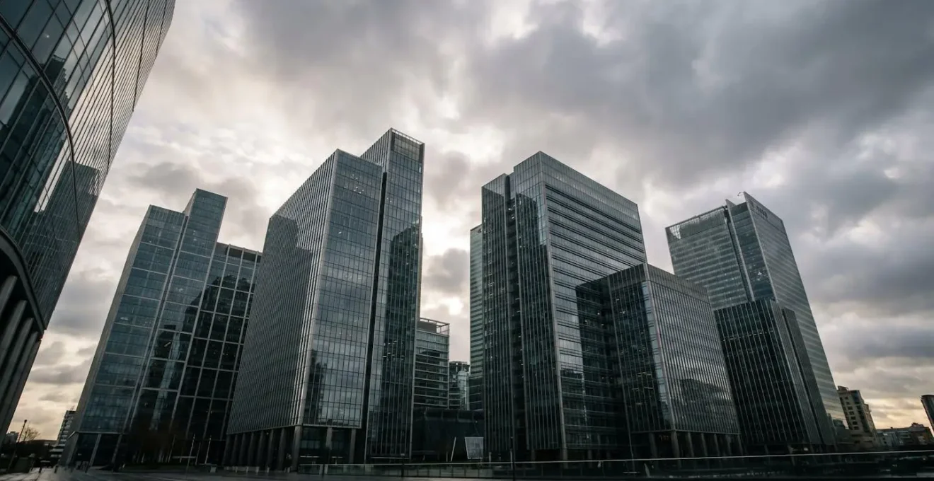 Modern glass office building facade reflecting signal waves in UK urban environment showing network connectivity challenges